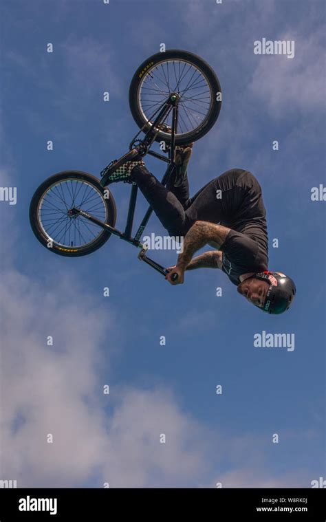 BMX tricks on a half pipe Stock Photo - Alamy