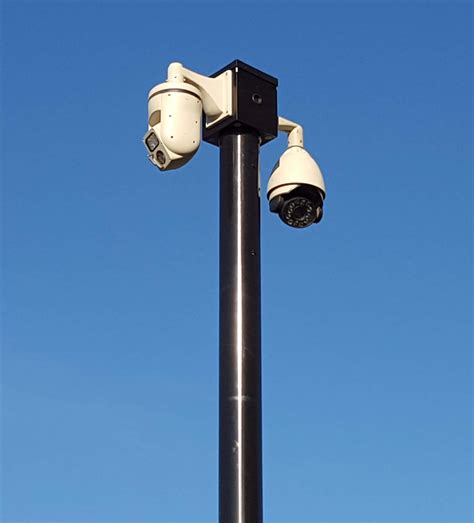 security camera poles with the ability to add lighting,