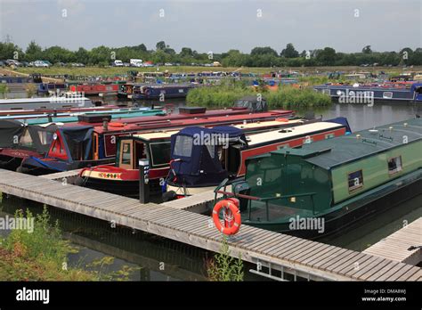 Canal boats moored at Mercia Marina, Willington, Derbyshire, one of the largest marinas in ...