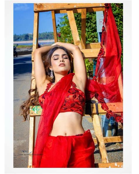 Neha Malik Hot Photoshoot - TeluguBulletin.com