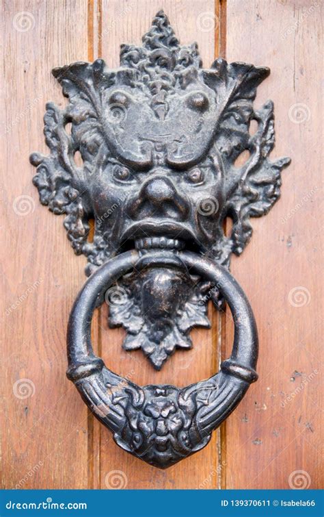 Decorative Door Knocker with Scary Face on Wooden Door , Bulgaria Stock ...