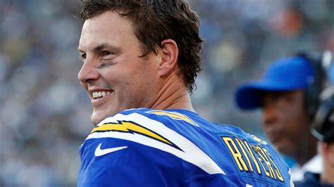 Record day: Chargers' Rivers sets 2 completion marks in win