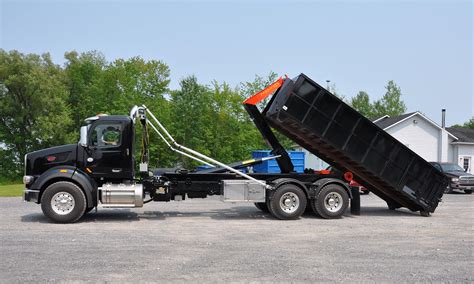 Ampliroll hooklift trucks for sale in Wisconsin & Illinois | RNOW Inc