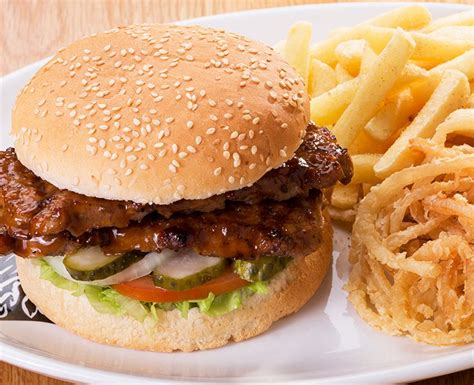 Rib Burger: Basted pork rib burger patties (2 x 100g). Read more: https://www.spur.co.za/menu ...