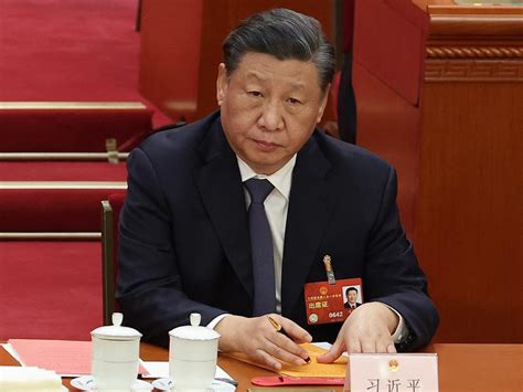 Xi Jinping is purging China's military — and it could disrupt its race ...