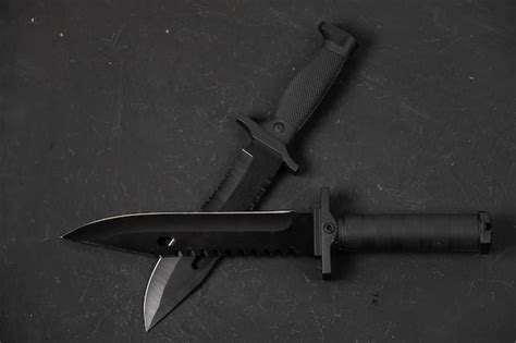 Premium Photo | Folding knives on a black background pen knives on a ...