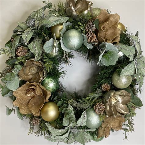 A soft sage green wreath with neutral accents and lots of texture. | Green holiday decor ...