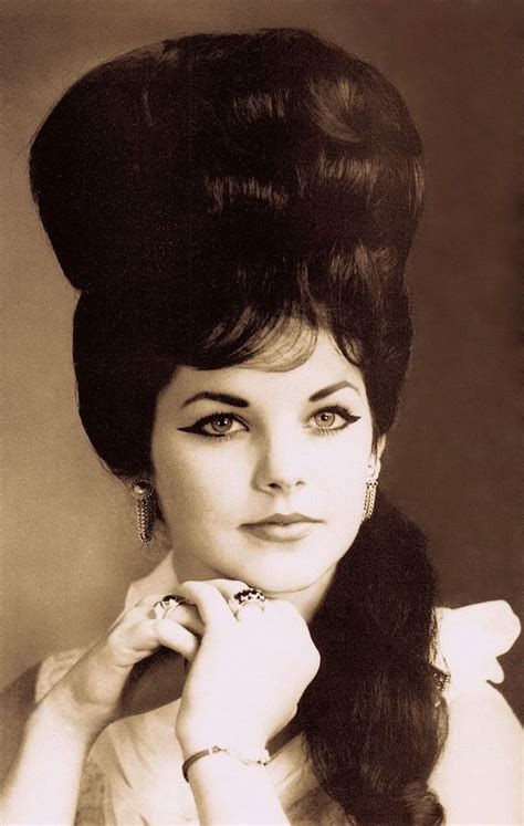 ELVIS PRESLEY'S young bride PRISCILLA (Beaulieu) PRESLEY (1967) wears her hair in the early 60's ...