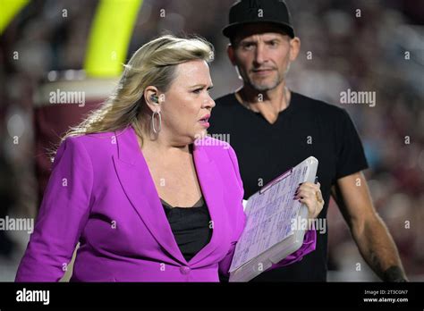 ESPN sideline reporter Holly Rowe walks behind the end zone during the ...