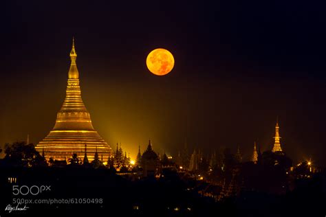 Photograph Shwedagon pagoda with the full moon by Regis Vincent on 500px