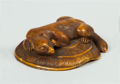 Netsuke of Animal on a Straw Mat under which is a Mouse | Japan | Edo (1615–1868) or Meiji ...