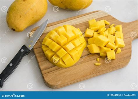 Diced Mango on a Wood Cutting Board Stock Image - Image of fresh, diet ...