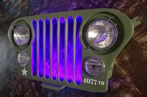 Original Jeep grill with glass head lights and original park lights. Painted Army green. Mancave ...