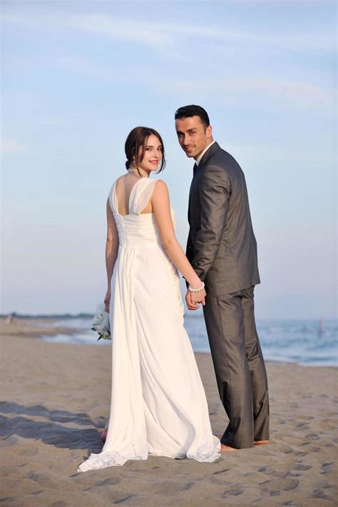 romantic beach wedding at sunset 12653831 Stock Photo at Vecteezy