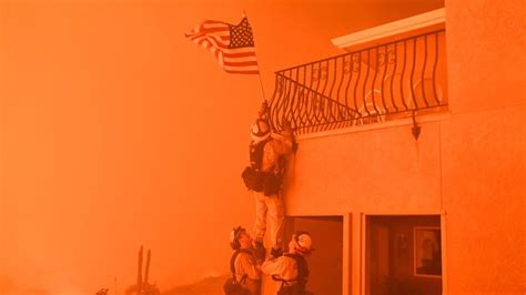 Surrounded by impending flames, California firefighters rescue US flag ...