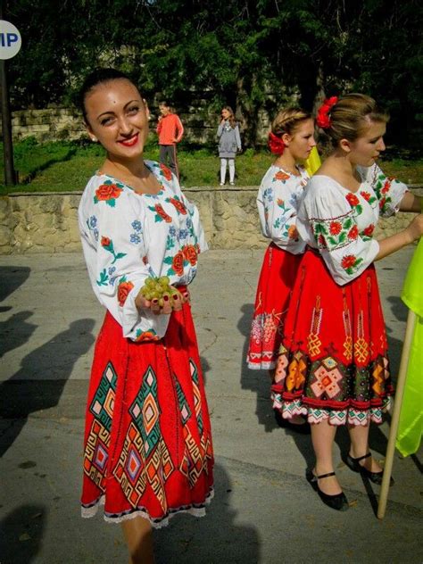 Ladies in traditional dress getting ready for a festival parade in Moldova. (V) | Traditional ...