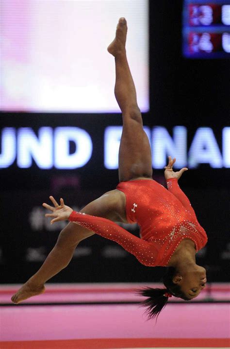 Spring's Simone Biles wins third straight world all-around gymnastics title