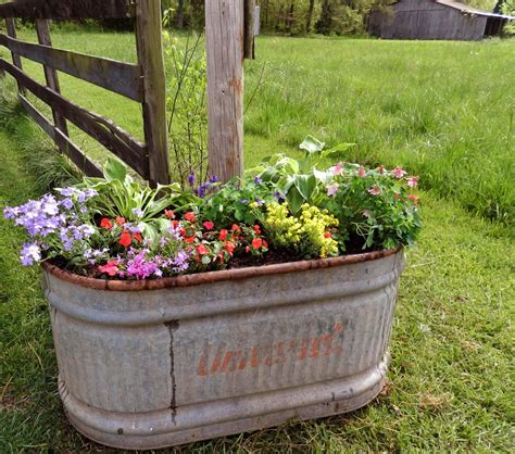 Pin by Kenzie Brown on Wedding decor | Garden yard ideas, Garden containers, Container gardening