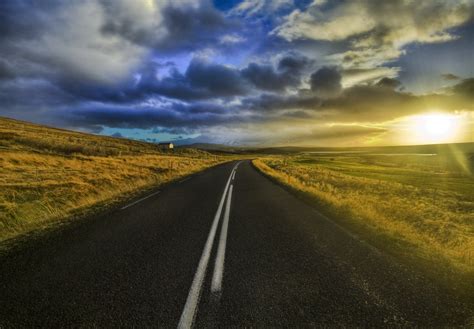 Landscape photography of concrete road during nimbus clouds HD wallpaper | Wallpaper Flare