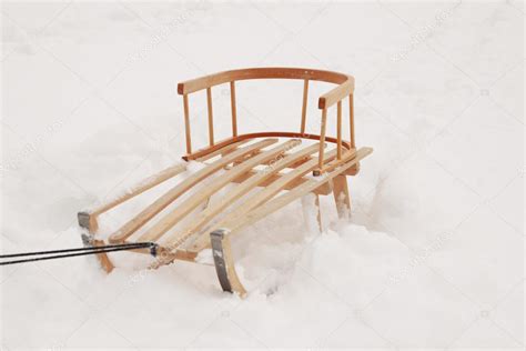 Wooden sledge in the snow — Stock Photo © agnieszka_g #6305600