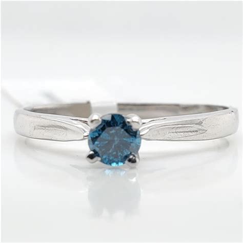 10K BLUE DIAMOND(0.19CT) RING - Able Auctions