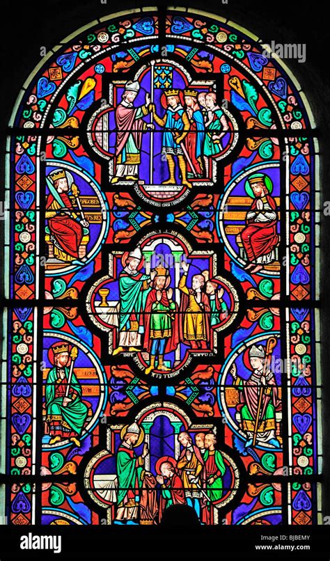 Romanesque coloured stained window, Glass painting in the church Stock Photo: 28527211 - Alamy