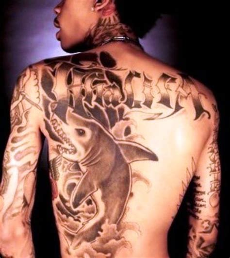 Wiz Khalifa's 9 Tattoos & Their Meanings - Body Art Guru