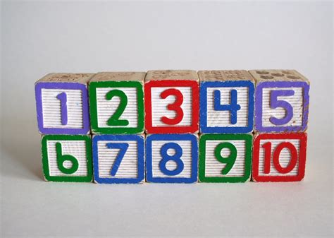 Vintage Colourful Number Wooden Blocks by littleredmercantile