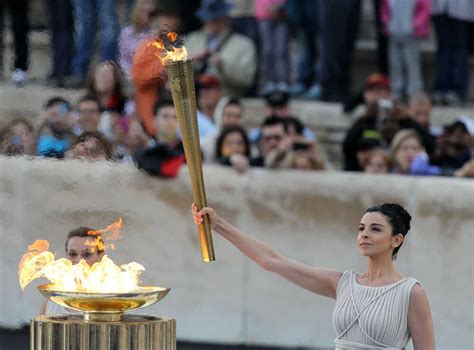 On Two First-Class Seats, Olympic Torch Arrives In England : The Two ...