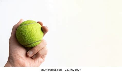 Holding Tennis Ball Photos and Images | Shutterstock