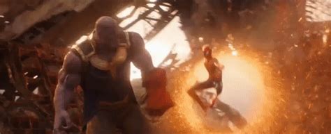 Doesn’t it look like Thanos is holding something | Spiderman, Infinity war, Tv spot