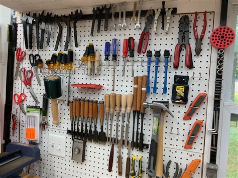 Organize a Shop with Pegboard | Peg board, Custom sign, Tool organization