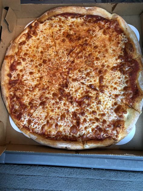 A large cheese pizza from my favorite shop in upstate NY: Aniello’s (Corning, NY) : r/Pizza