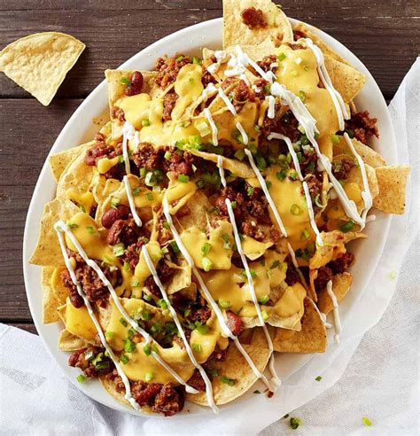 Chili Cheese Nachos are nachos piled high with my homemade chili and ...