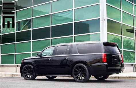 All Black Chevy Suburban on Custom Wheels by Exclusive Motoring — CARiD.com Gallery