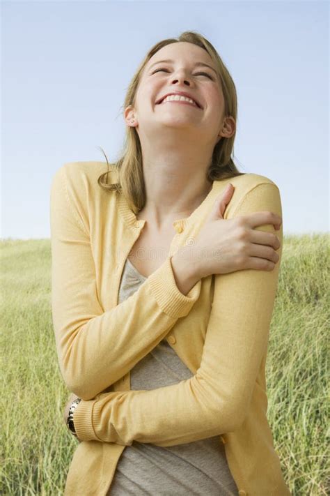 Woman Laughing Outside stock photo. Image of grinning - 14647002