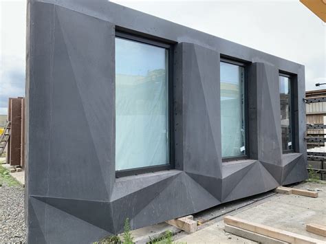 DXA Studio’s ‘The Maverick’ wraps up facade install of acid-etched precast concrete panels ...