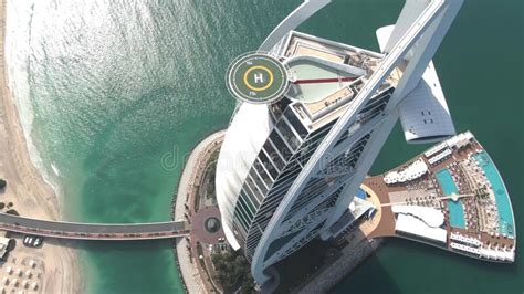 DUBAI, UNITED ARAB EMIRATES - JANUARY 2, 2020. Aerial Shot Of The Burj Al Arab Hotel Helipad And ...