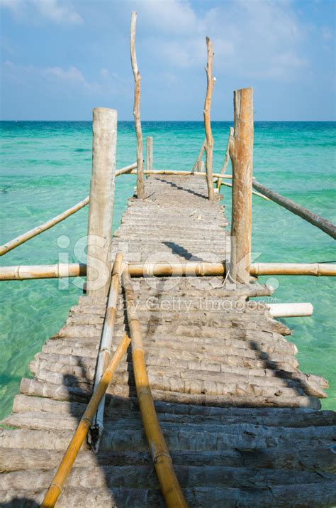 Simple Traditional Wooden Pier On Beautiful Beach Stock Photo | Royalty-Free | FreeImages