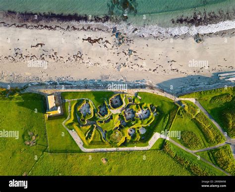 Aerial view of Skara Brae stone-built Neolithic settlement, located on the Bay of Skaill , west ...