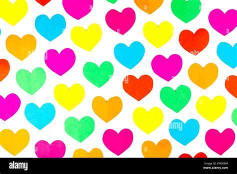 Rows of different colored paper hearts isolated on white background ...