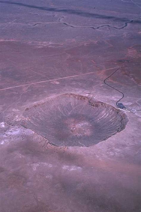 Impacting Meteorites and Their Craters