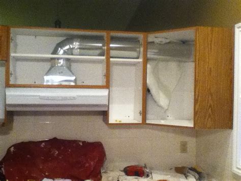 Replace a microwave with a venting hood.