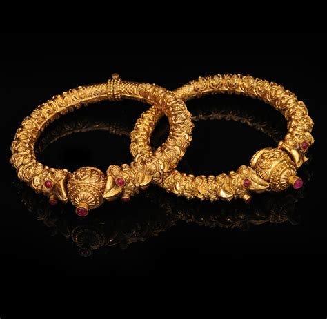 Indian Jewellery and Clothing: Latest antique gold bangle models..