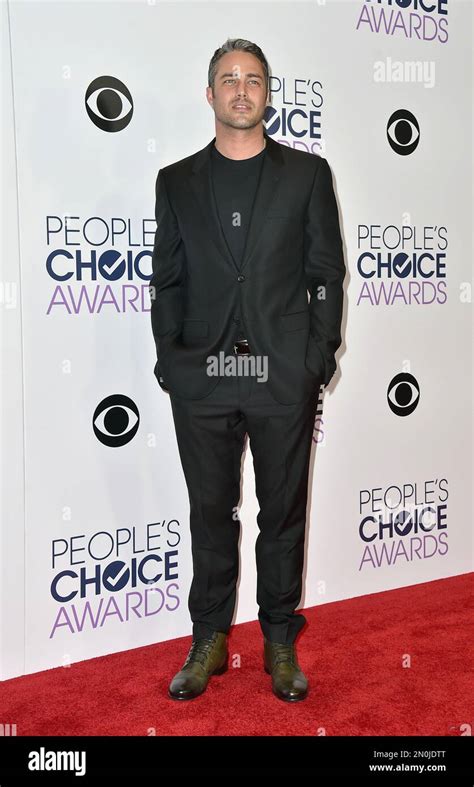 Taylor Kinney poses in the press room with the award for favorite ...