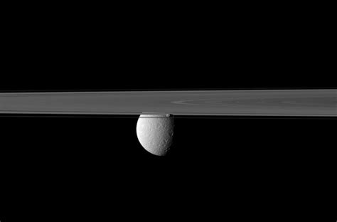 Cutting Off Rhea - NASA Science