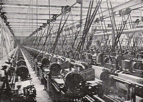 an old black and white photo of many machines in a room with lots of wires