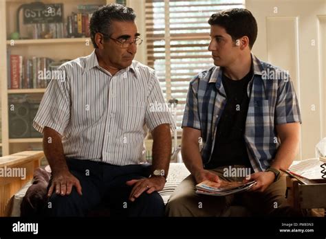 (L to R) Jims Dad (EUGENE LEVY) sets Jim (JASON BIGGS) straight in ...