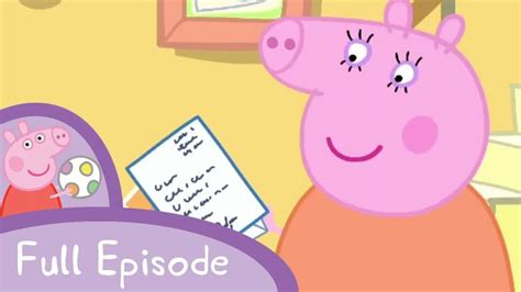 peppa the pig is holding a piece of paper