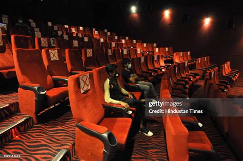 Cinema goers maintain social distance while watching a movie... News Photo - Getty Images